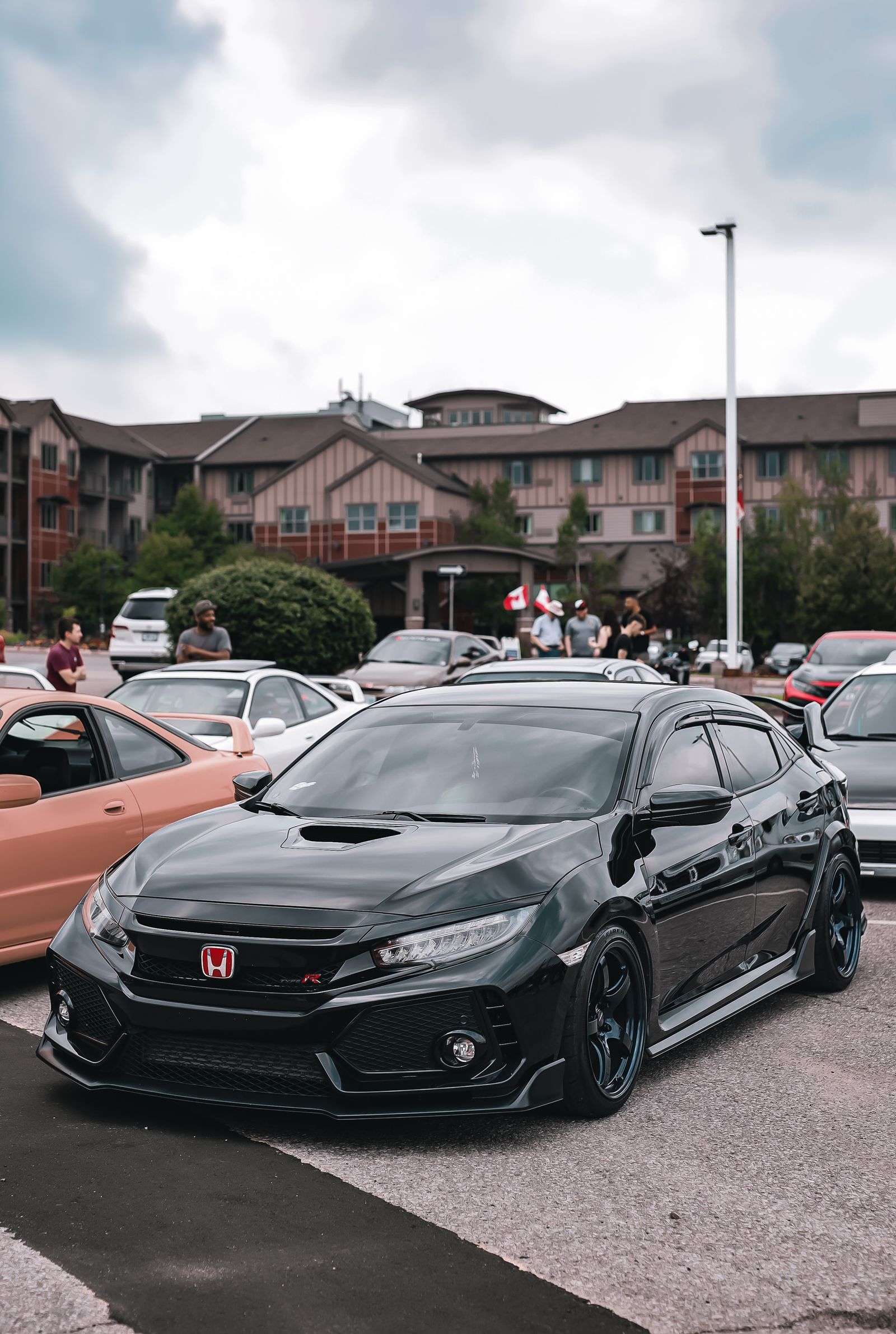 Black Honda Civic at an outdoor car gathering
