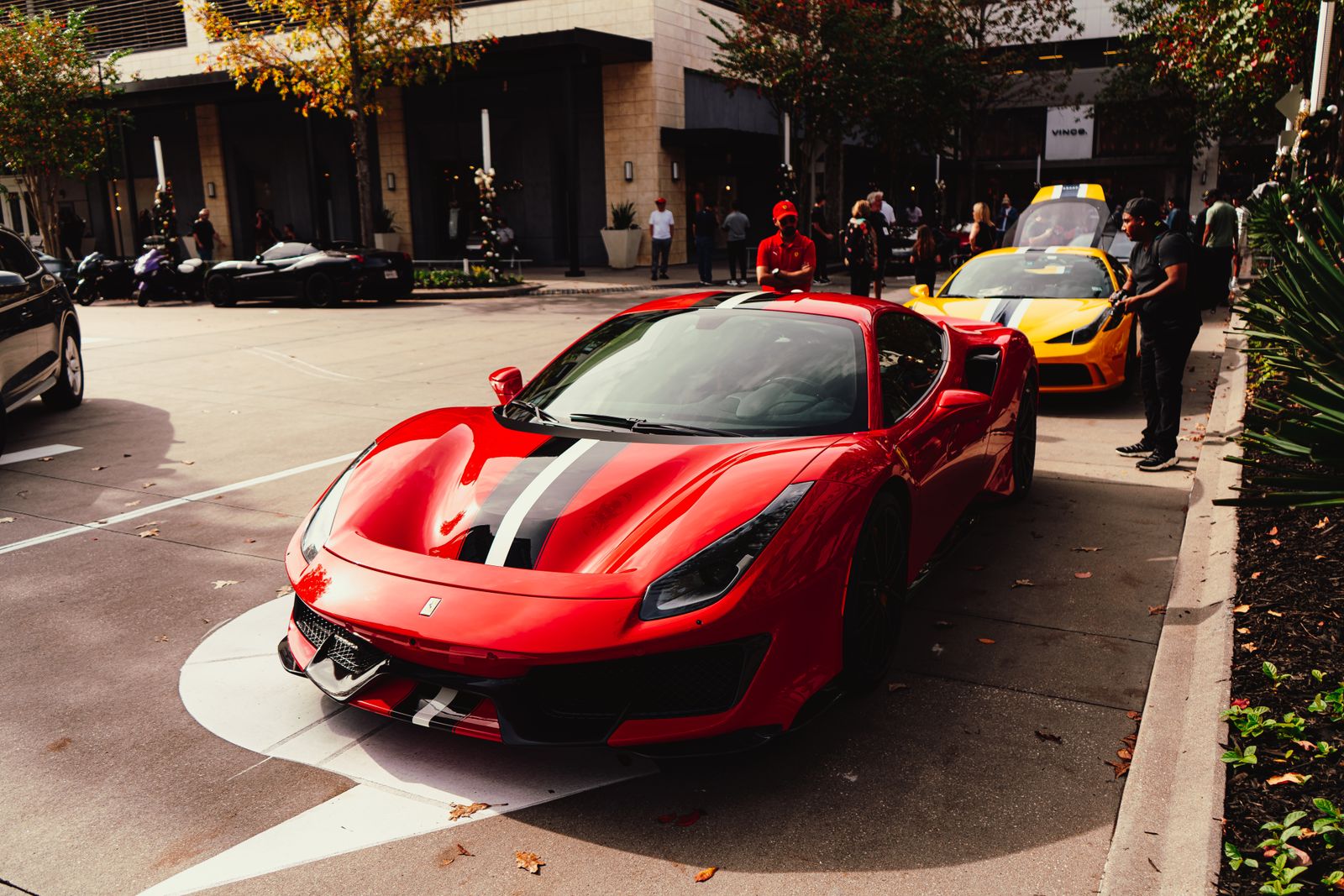 Red Ferrari sports car at a public car show