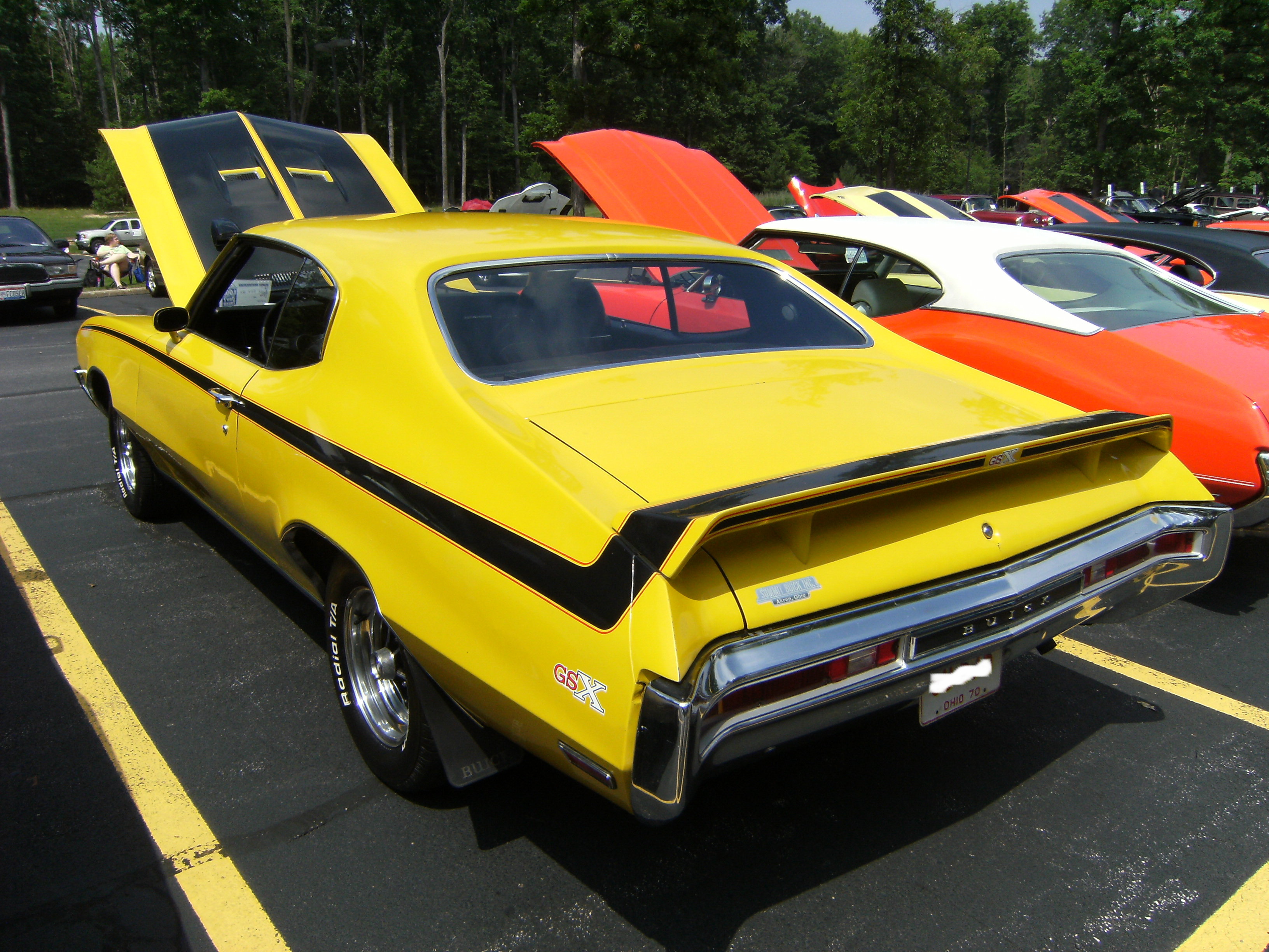 Yellow 1970 Buick GSX with factory-style spoilers and stripes