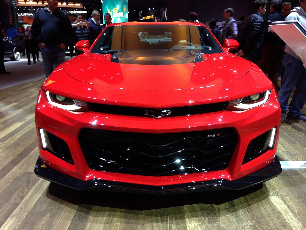 Red sixth-generation Chevrolet Camaro ZL1 at an auto show