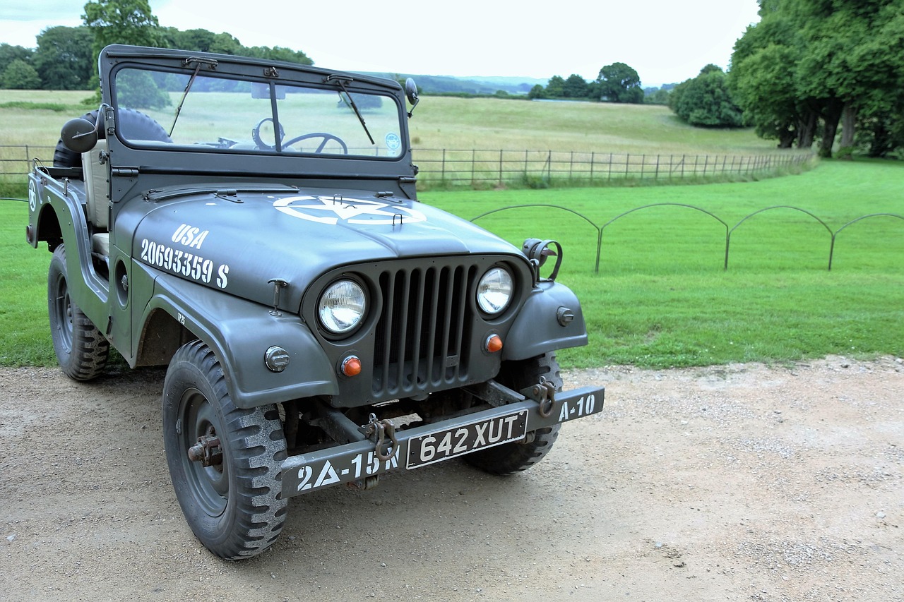 Restored green military Jeep outdoors